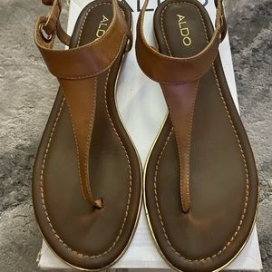 Women thing tan and gold accent buckle on the side